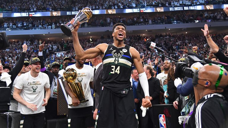 Giannis with NBA trophy