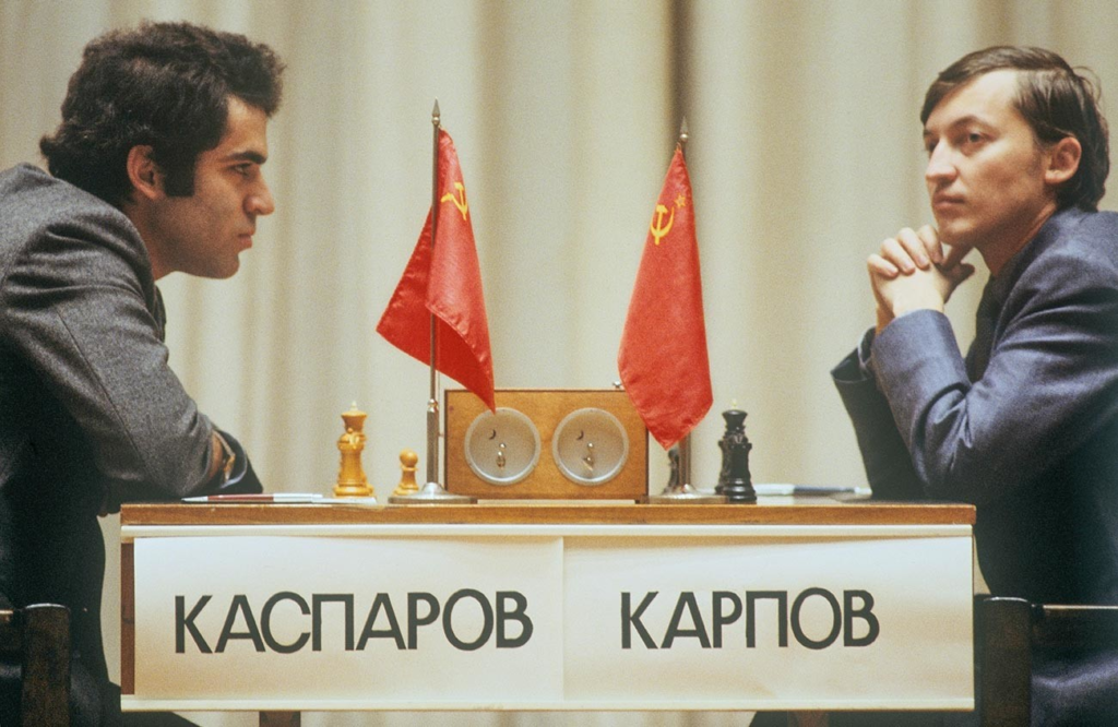 Kasparov vs Karpov playing chess with Soviet flag