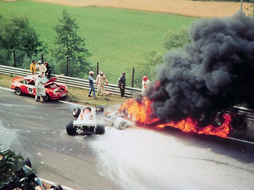 Lauda's car burning on the race track