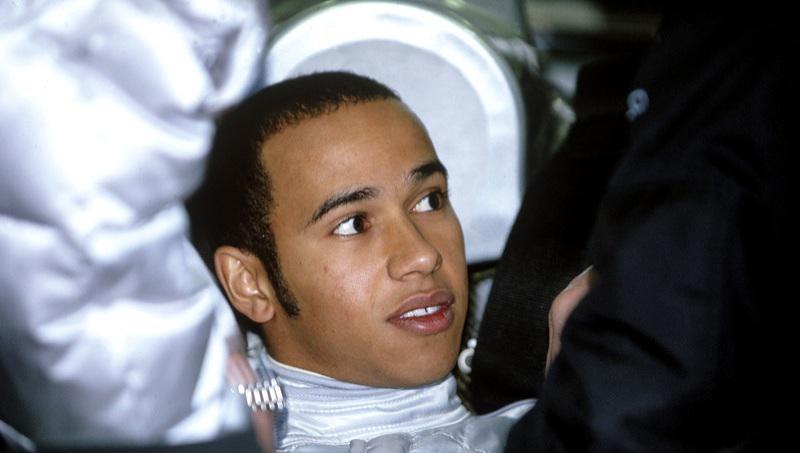 Young Lewis Hamilton in race car