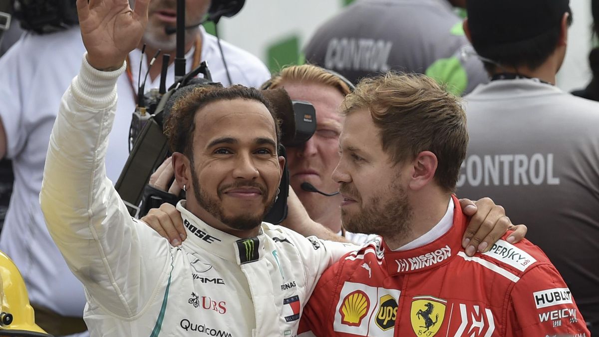 Lewis Hamilton with Vettel