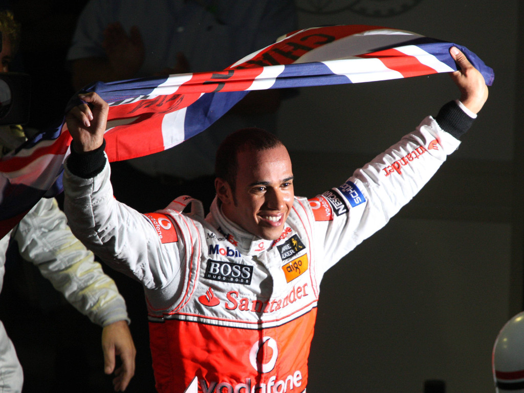 Lewis Hamilton celebrating first F1 championship with Union Jack