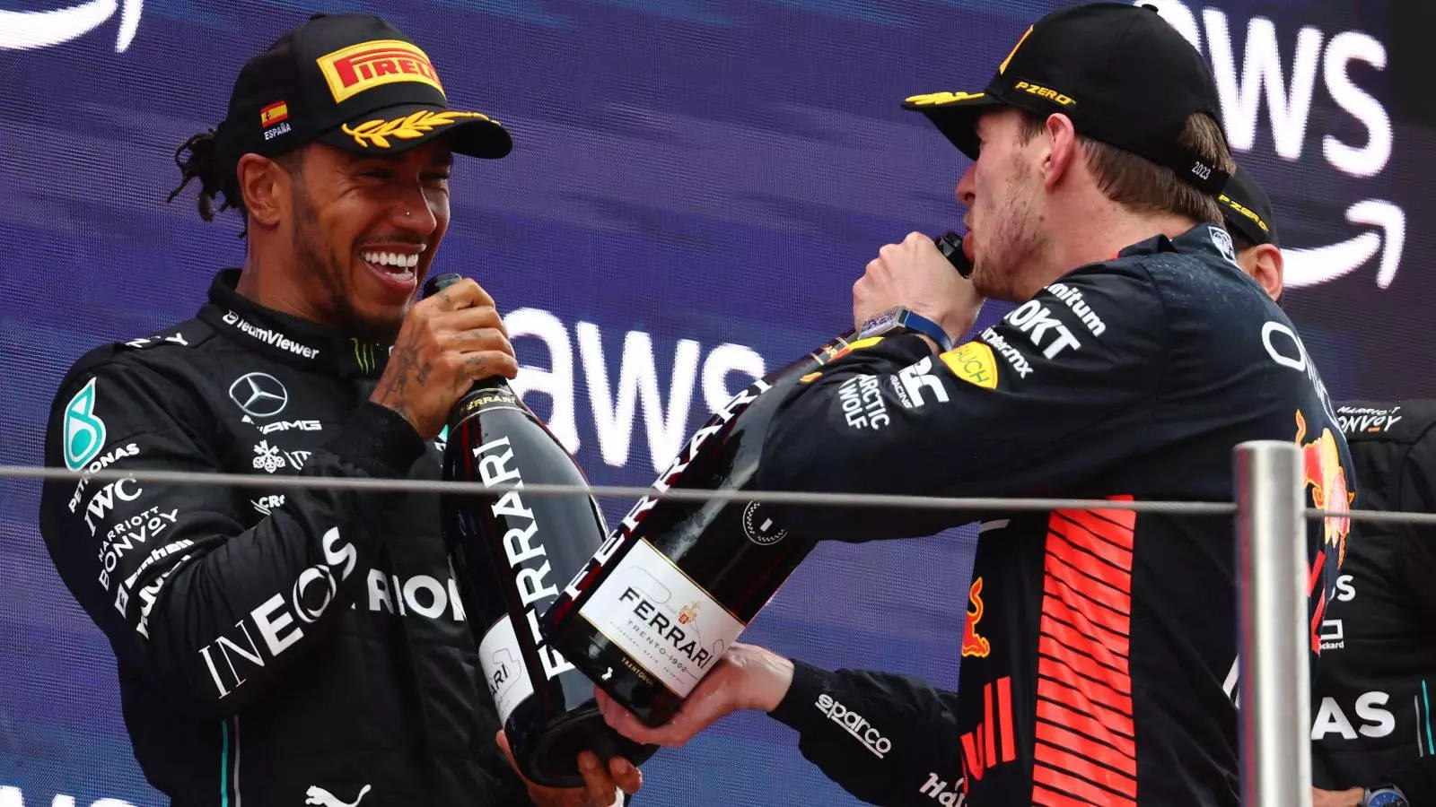 Lewis Hamilton celebrating with Max Verstappen
