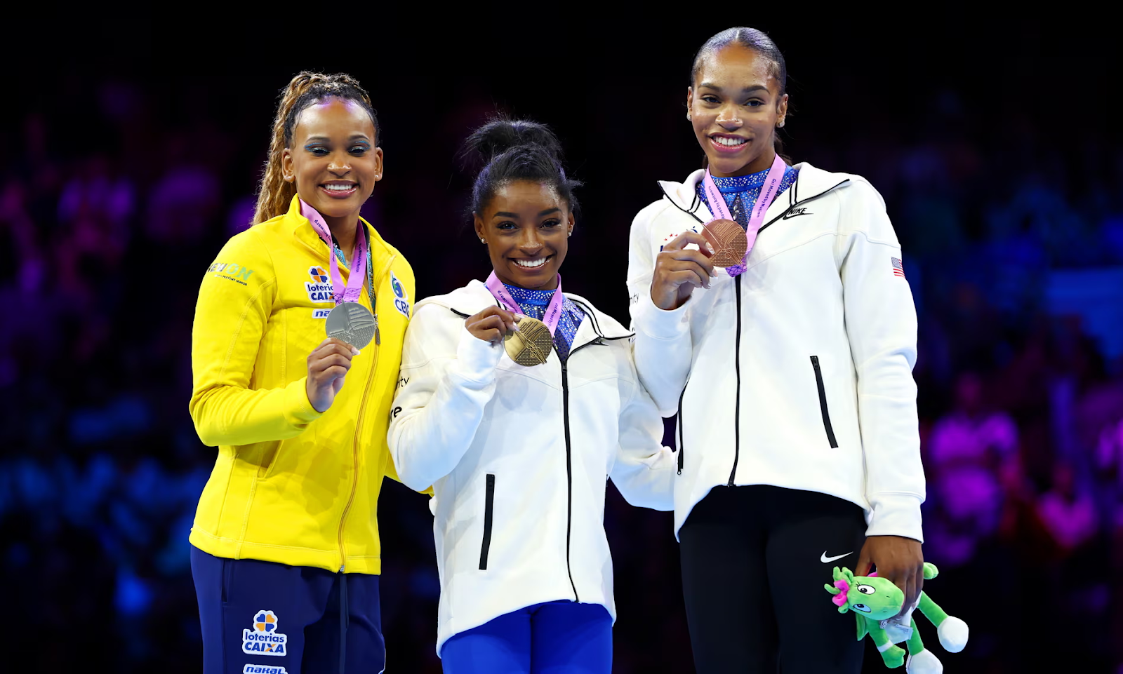 Simone Biles with two other black gymnasts