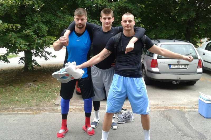 Nikola Jokic with his brothers