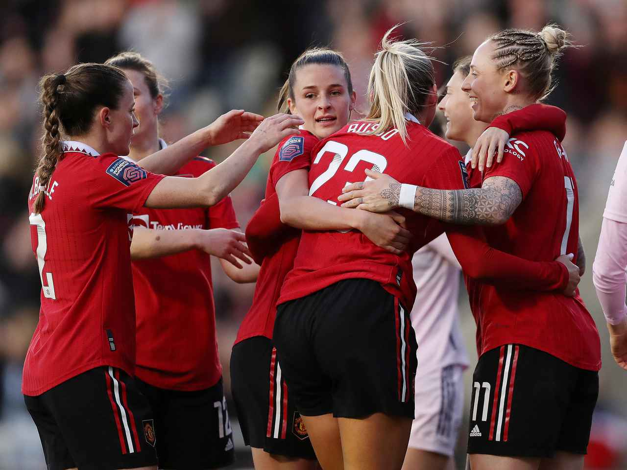 Manchester United women celebrating a goal