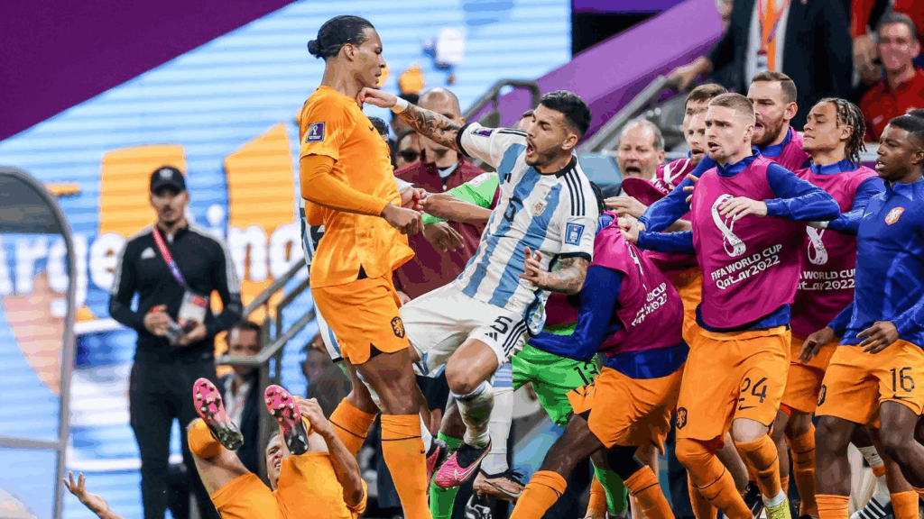 Virgil van Dijk shoves Leandro Paredes during a game at the 2022 World Cup