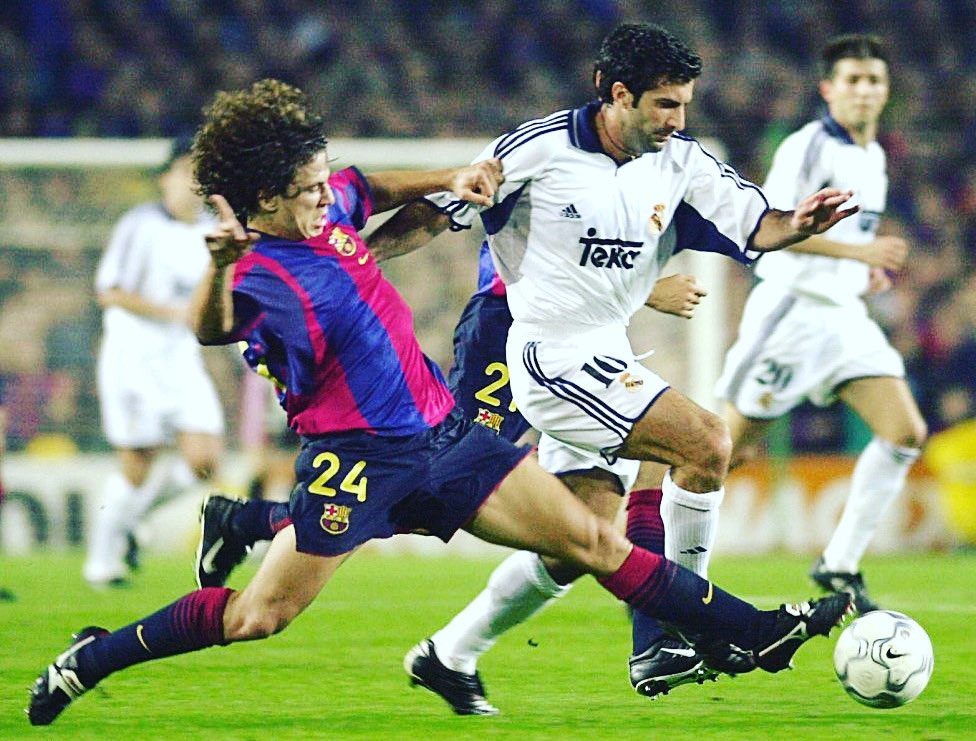 Puyol making a strong challenge against Madrid