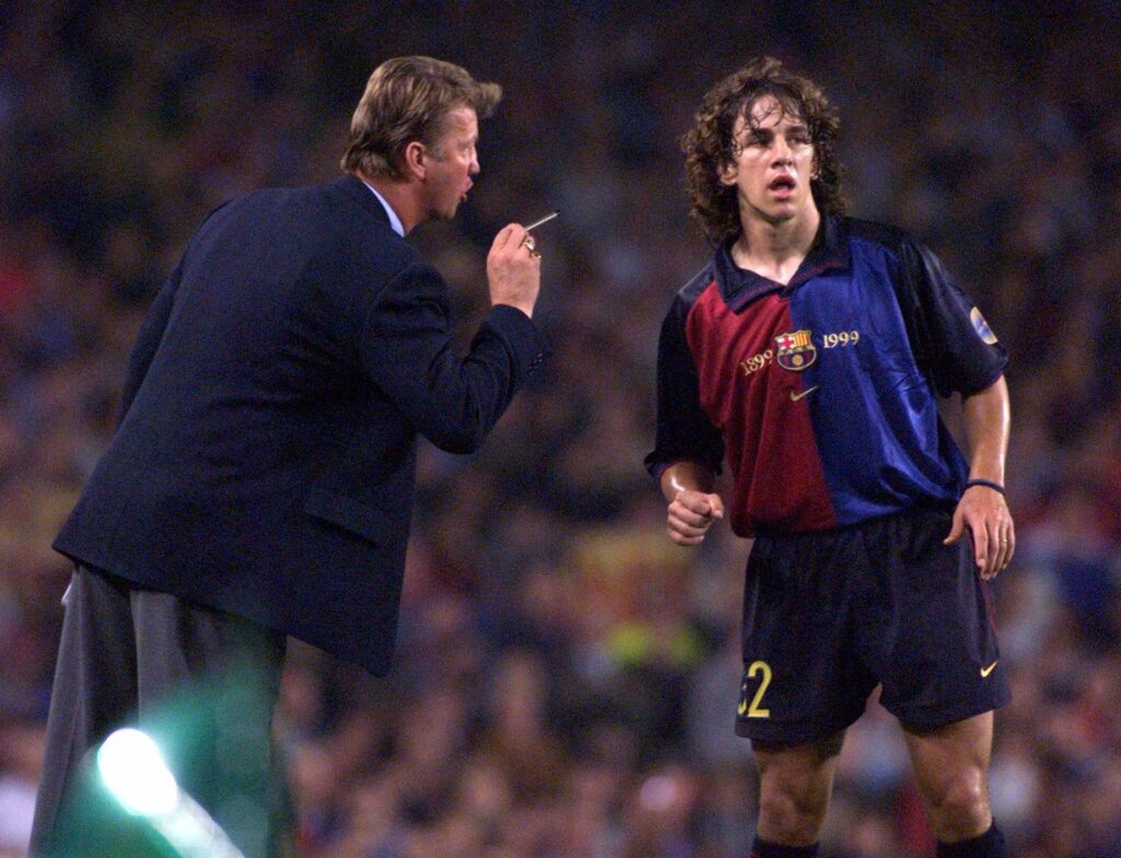 Louis Van Gaal giving instructions to Carles Puyol during his early days at Barcelona