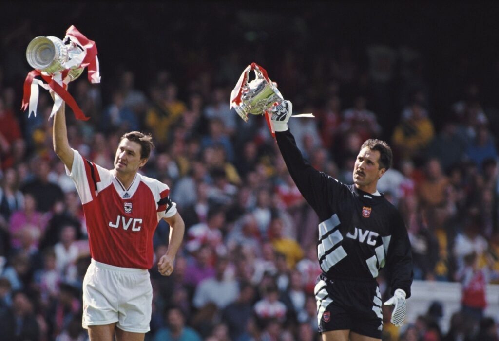 The Leader of the famous back 4, Tony Adams celebrating a trophy with David Seaman