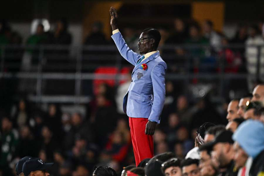Michael Kuka Mboladinga standing motionless during DR Congo game at the 2025 AFCON.