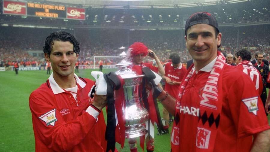 Ryan Giggs one of United's greatest one club men celebrating a trophy with teammate Eric Cantona