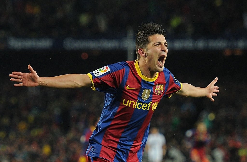 David Villa celebrates as Barcelona beat Real Madrid 5-0