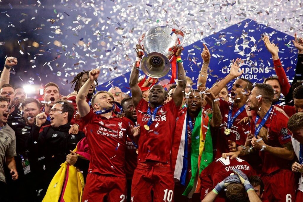 Mane lifting the Champions League Trophy
