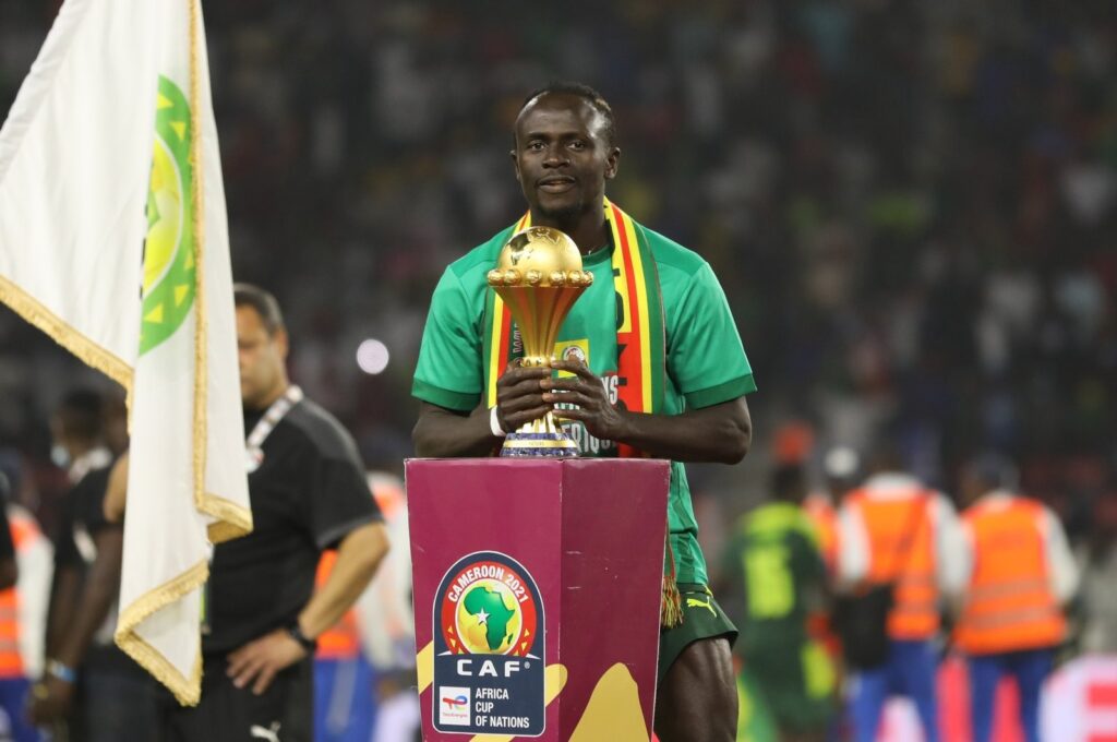 Mane lifting the AFCON trophy