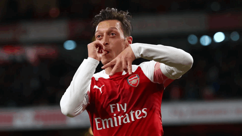 Mesut Ozil playing for Arsenal