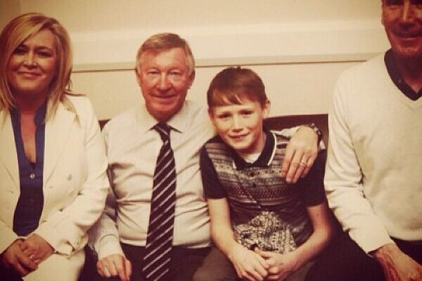 McTominay taking a pciture with Sir Alex Ferguson