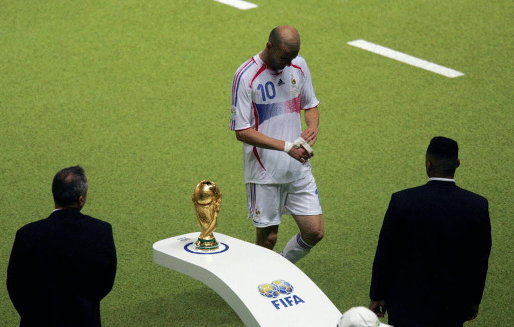 Zinedine Zidane walks past the World Cup trophy down the tunnel in the 2006 final