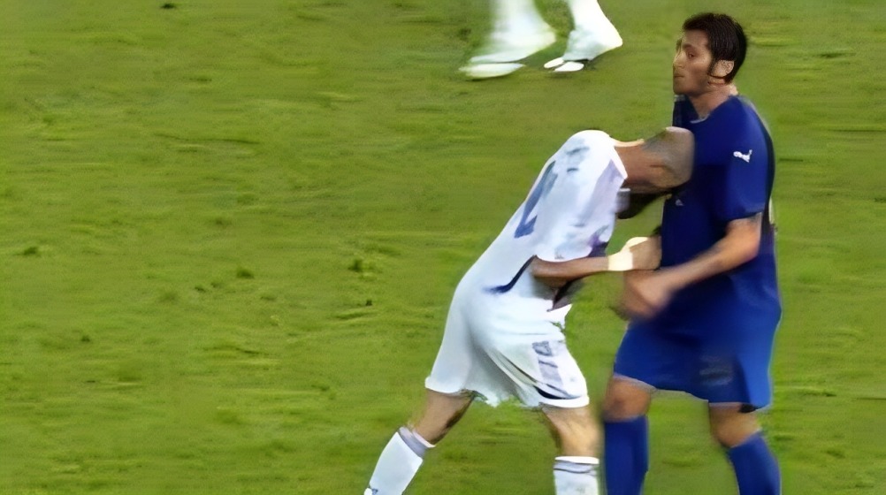 Zinedine Zidane headbutting Marco Materazzi in the chest in the final of the 2006 World Cup between France and Italy.