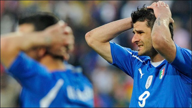 Mario Gómez with his hands on his head after Italy were knocked out of the 2010 World Cup