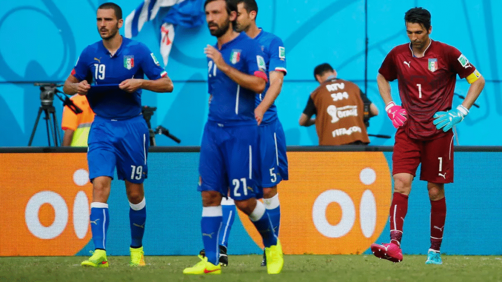 Andrea Pirlo, Leonardo Bonucci and Gigi Buffon looking dejected followig Italy's elimination from the 2014 FIFA World Cup