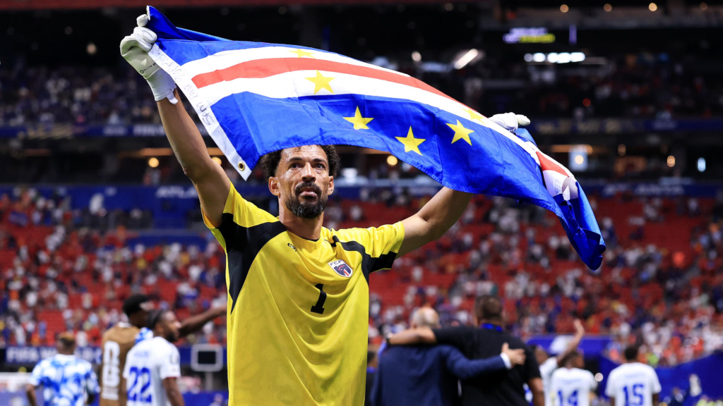 Vozinha holding the Cape Verde flag