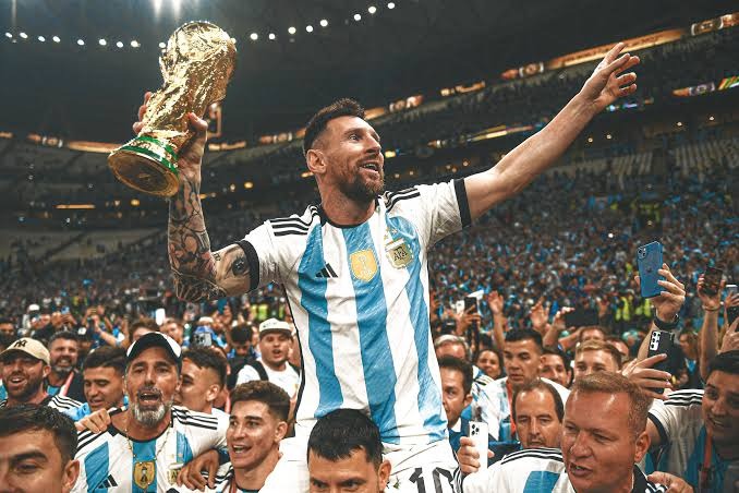 Messi lifting the World Cup trophy