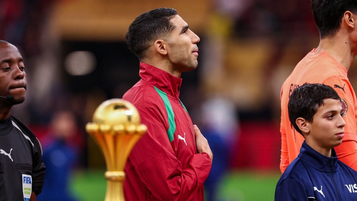 Hakimi beside the AFCON trophy at AFCON 2025