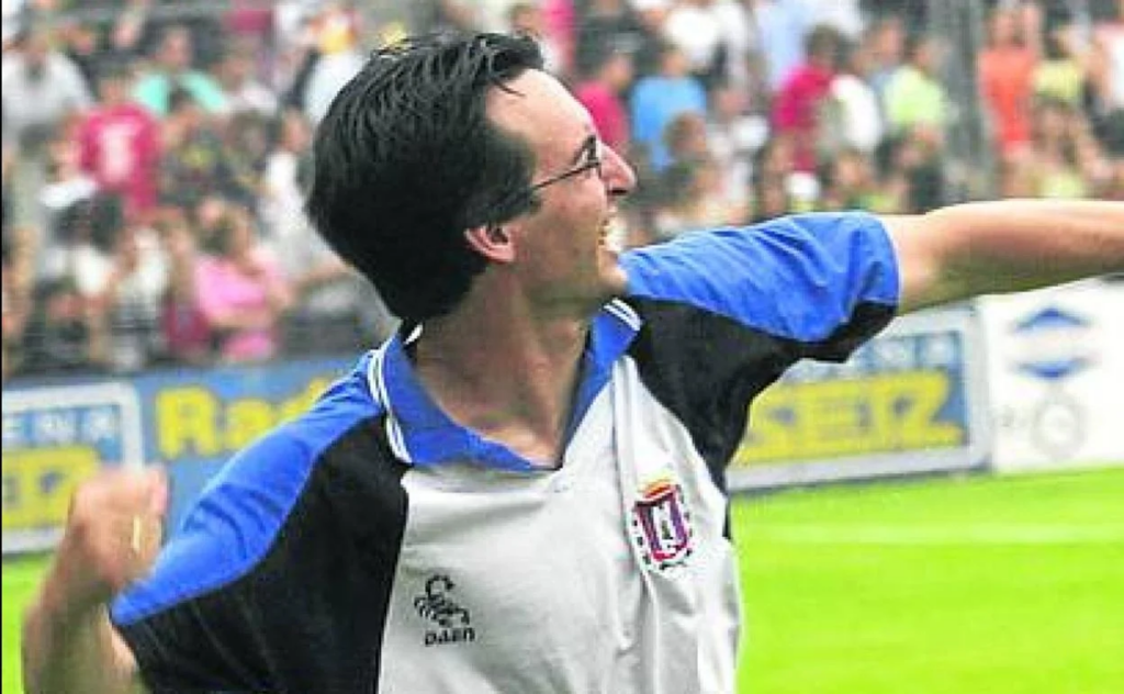 Unai Emery celebrates as Lorca Deportiva manager