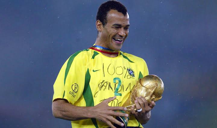 Cafu holds the FIFA World Cup trophy after Brazil's 2002 victory