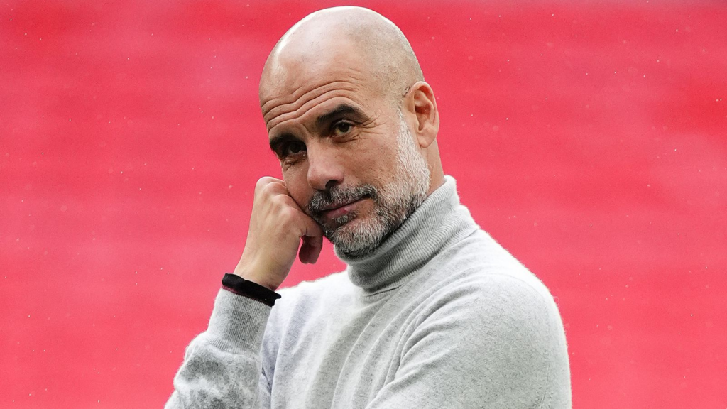 Pep Guardiola looks on after winning the 2026 FA Cup with Manchester City