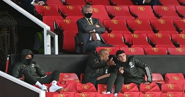 Jesse Lingard watching a game from the standings during the covid 19 era 