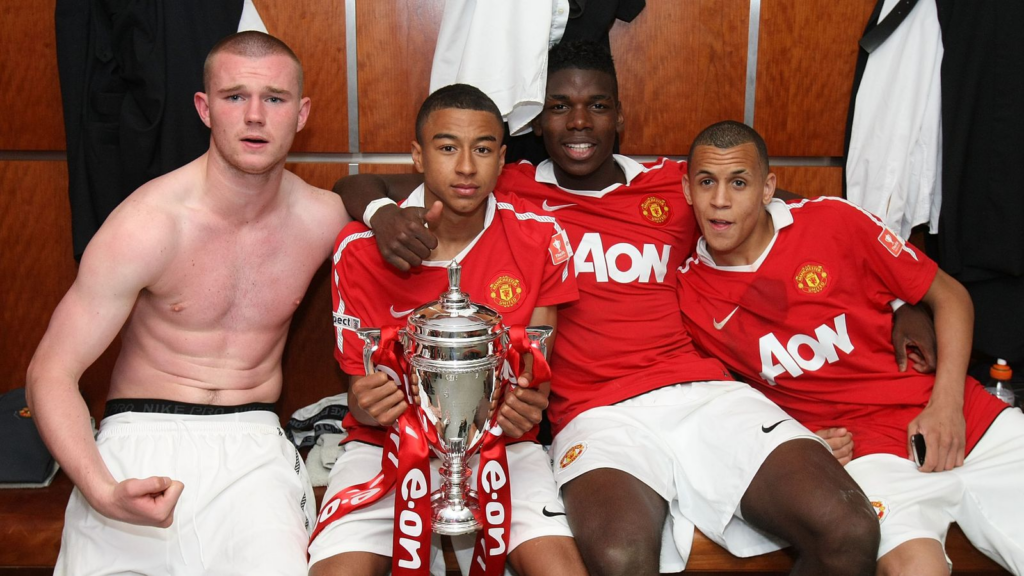 Lingard together with Paul Pogba and other Manchester United youngsters celebrating the 2011 Youth FA Cup win